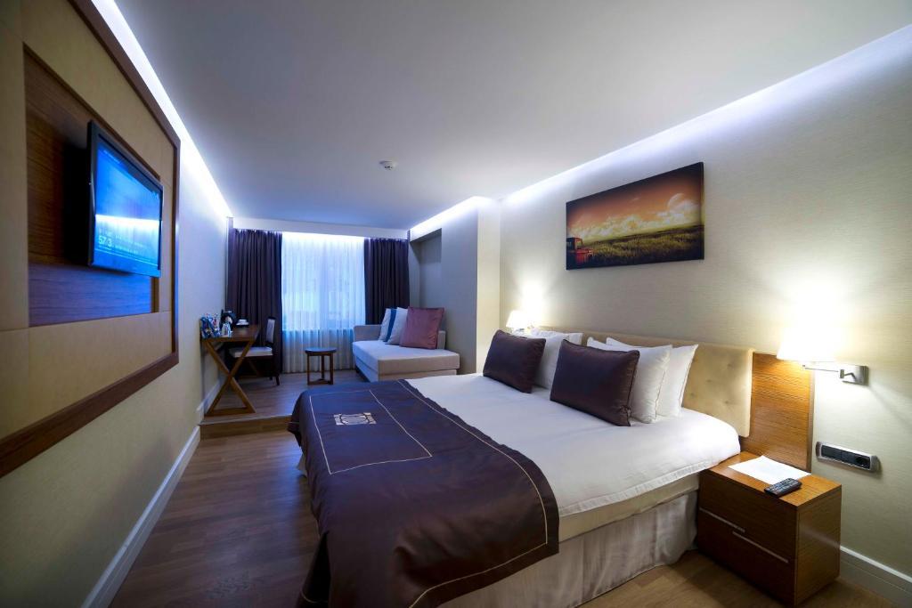 Taba Luxury Suites And Hotel Стамбул Номер фото